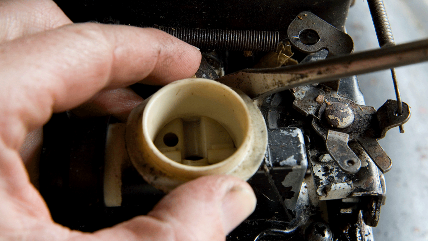 carburetor on a lawnmower engine